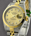 Lady's 2-Tone Datejust in Steel and Yellow Gold Fluted Bezel on Jubilee Bracelet with Champagne Diamond Dial