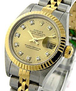 Lady's 2-Tone Datejust in Steel and Yellow Gold Fluted Bezel on Jubilee Bracelet with Champagne Diamond Dial
