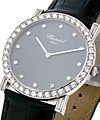 Lady's Classique - Round in Platinum Platinum on Strap with Black Dial on Strap 