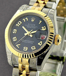 Datejust 26mm Ladies in Steel with Yellow Gold Fluted Bezel on Steel and Yellow Gold Jubilee Bracelet with Blue Arabic Concentric Dial