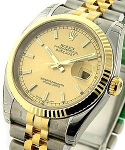 Datejust 36mm in Steel with Yellow Gold Fluted Bezel on Jubilee Bracelet with Champagne Stick Dial