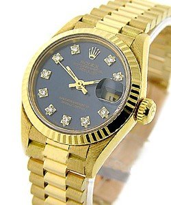President in Yellow Gold with Fluted Bezel on Yellow Gold President Bracelet with Blue Diamond Dial