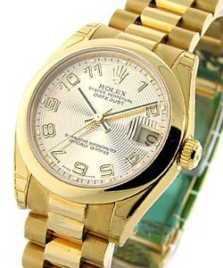 Datejust 31mm Mid Size in Yellow Gold with Domed Bezel on Yellow Gold President Bracelet with Champagne Concentric Arabic Dial