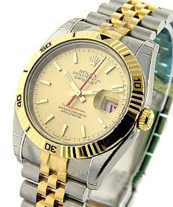 Datejust in Steel with Yellow Gold Turm-o-graph Bezel on Steel and Yellow Gold Jubilee Bracelet with Champagne Stick Dial