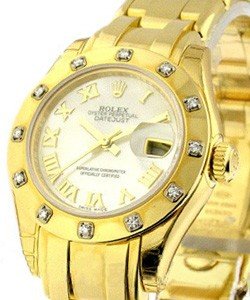 Masterpeice Lady's in Yellow Gold with 12 Diamond Bezel on Yellow Gold Pearlmaster Bracelet with Mother of Pearl Roman Dial