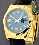 Datejust in Yellow Gold with Fluted Bezel On Black Alligator Leather Strap with Blue Index Dial