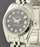 Lady's Datejust in Steel with White Gold Fluted Bezel on Steel Jubilee Bracelet with Black Diamond Dial