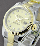 Datejust in Steel with Yellow Gold Fluted Bezel on Steel and Yellow Gold Oyster Bracelet with  Champagne Diamond Dial