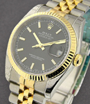 Datejust 36mm in Steel with Yellow Gold Fluted Bezel on Jubilee Bracelet with Black Luminous Stick Dial