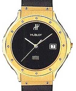Classic Mid Size 32mm in Yellow Gold on Black Rubber Strap with Black Dial
