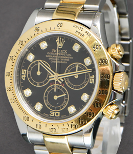 Daytona 40mm in Steel with Yellow Gold Bezel on Oyster Bracelet with Black Diamond Dial