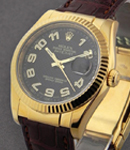 Datejust in Yellow Gold with Fluted Bezel on Strap with Black Arabic Dial