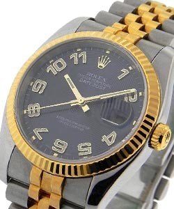 Datejust 36mm in Steel with Yellow Gold Fluted Bezel on Steel and Yellow Gold Jubilee Bracelet with Blue Concentric Arabic Dial