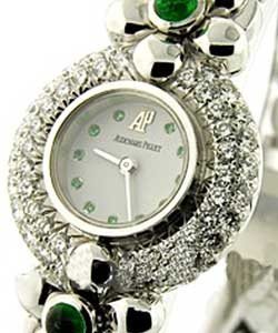 Round 21mm Quartz in White Gold with Diamonds Bezel and Emerald Lugs on WHite Gold Bracelet with Silver Dial