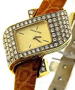 Lady's Quartz in Yellow Gold with Diamond Bezel on Brown Leather Strap with Chamapnge Dial