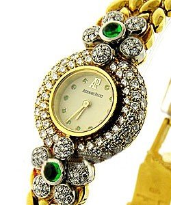Round 21.8mm Quartz in Yelow Gold with Diamonds Bezel & Lugs on Yellow Gold Bracelet with Ivory Dial