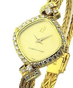 Lady's Diamond Dress Watch with Yellow Gold with Diamond Bezel on Yellow Gold Rope Bracelet with Champagne Dial