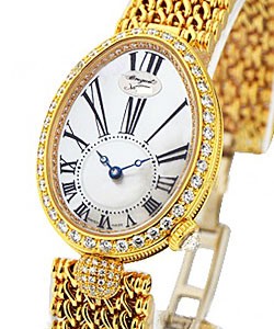 Reine De Naples 33mm Automatic in Yellow Gold with Baguette Diamond Bezel on Yellow Gold Bracelet with MOP Dial