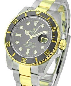 Submariner 2 Tone in Steel with Black Ceramic Bezel  on Steel and Yellow Gold Oyster Bracelet with Black Diamond Dial