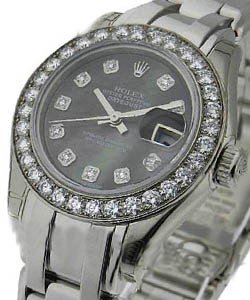Masterpiece Lady's in White Gold with 32 Diamond Bezel on White Gold Pearlmaster Bracelet with Black MOP Diamond Dial