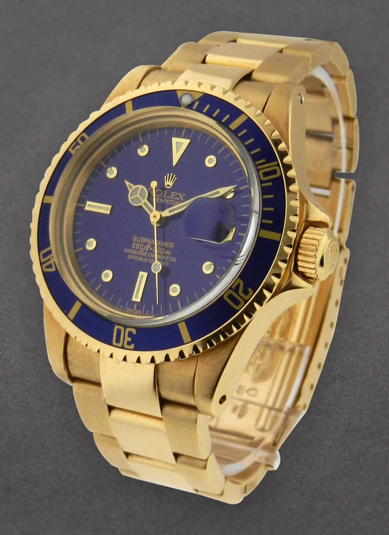 Pre-Owned Rolex Submariner in Yellow Gold With Blue Bezel