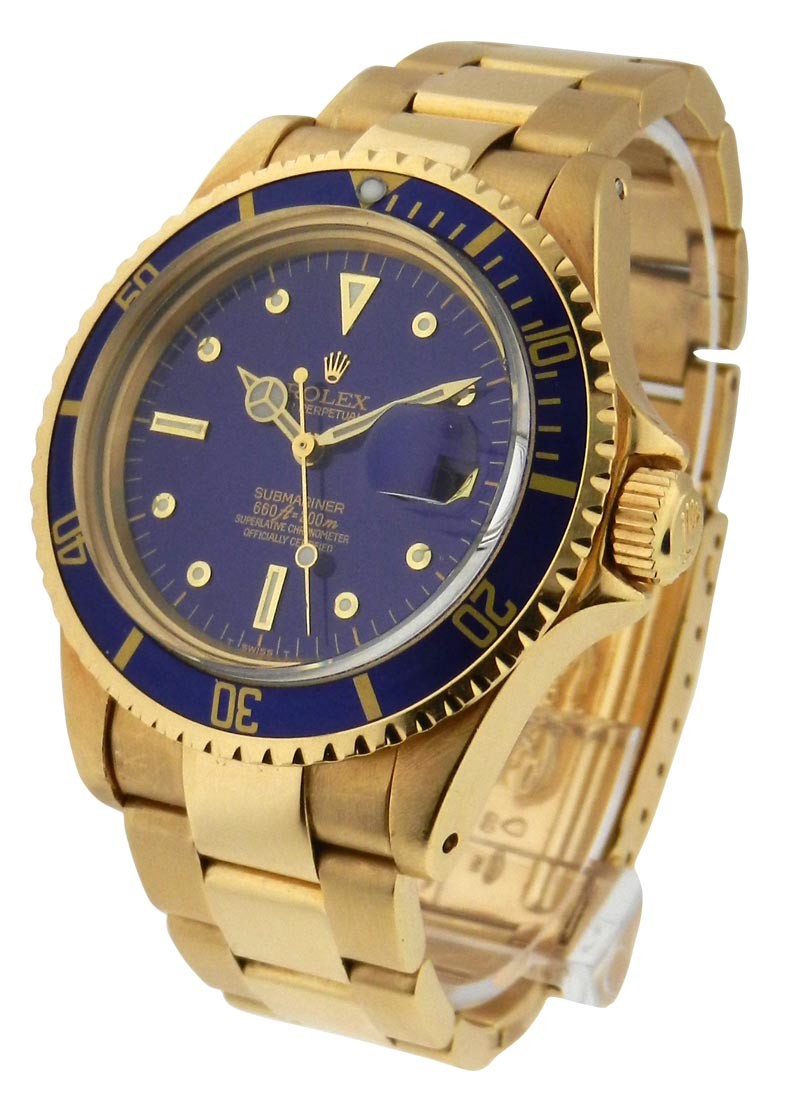 Pre-Owned Rolex Submariner in Yellow Gold With Blue Bezel