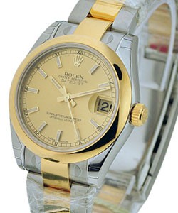 Datejust in Steel with Yellow Gold Domed Bezel on Oyster Bracelet with Champagne Index Dial