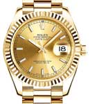 Datejust Midsize 31mm in Yellow Gold with Fluted Bezel on Bracelet with Champagne Stick Dial