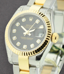 Datejust in Steel with Yellow Gold Fluted Bezel on Steel and Yellow Gold Oyster Bracelet with  Black Diamond Dial