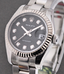 Datejust Ladies 26mm in Steel with White Gold Bezel on Steel Oyster Bracelet with Black Jubilee Diamond Dial