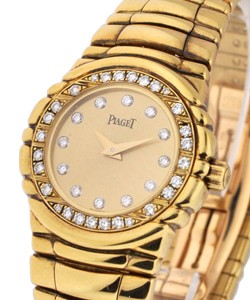 Tanagra 24mm with Diamond Bezel Yellow Gold on Bracelet with Champagne Diamond Dial