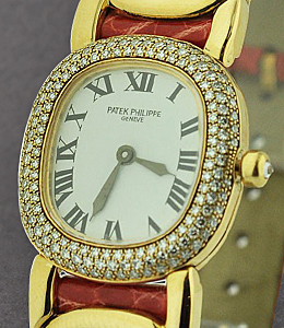 Lady's Golden Ellipse with Diamond Bezel Ref 4830 J  Yellow Gold on Red Strap