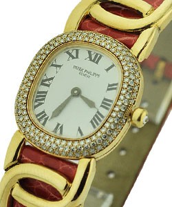 Lady's Golden Ellipse with Diamond Bezel  Ref 4830 J  Yellow Gold on Red Strap