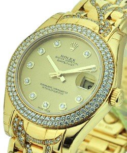 Masterpiece in Yellow Gold with Diamond Bezel on Yellow Gold Pearlmaster Diamond Bracelet with Champagne Diamond Dial