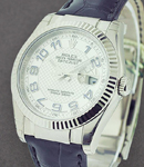 Datejust 36mm in White Gold with Fluted Bezel on Strap with Silver Dial with Blue Arabics