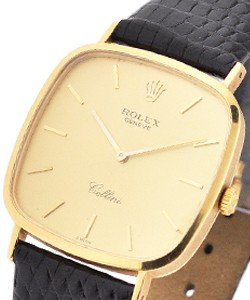 Cellini in Yellow Gold on Black Strap with Champagne Dial
