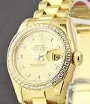 Datejust 26mm in Yellow Gold with Diamond Bezel on President Bracelet with Champagne Diamond Dial