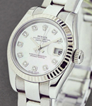 Lady's Datejust in Steel with White Gold Fluted Bezel on Steel Oyster Bracelet with MOP Diamond Dial