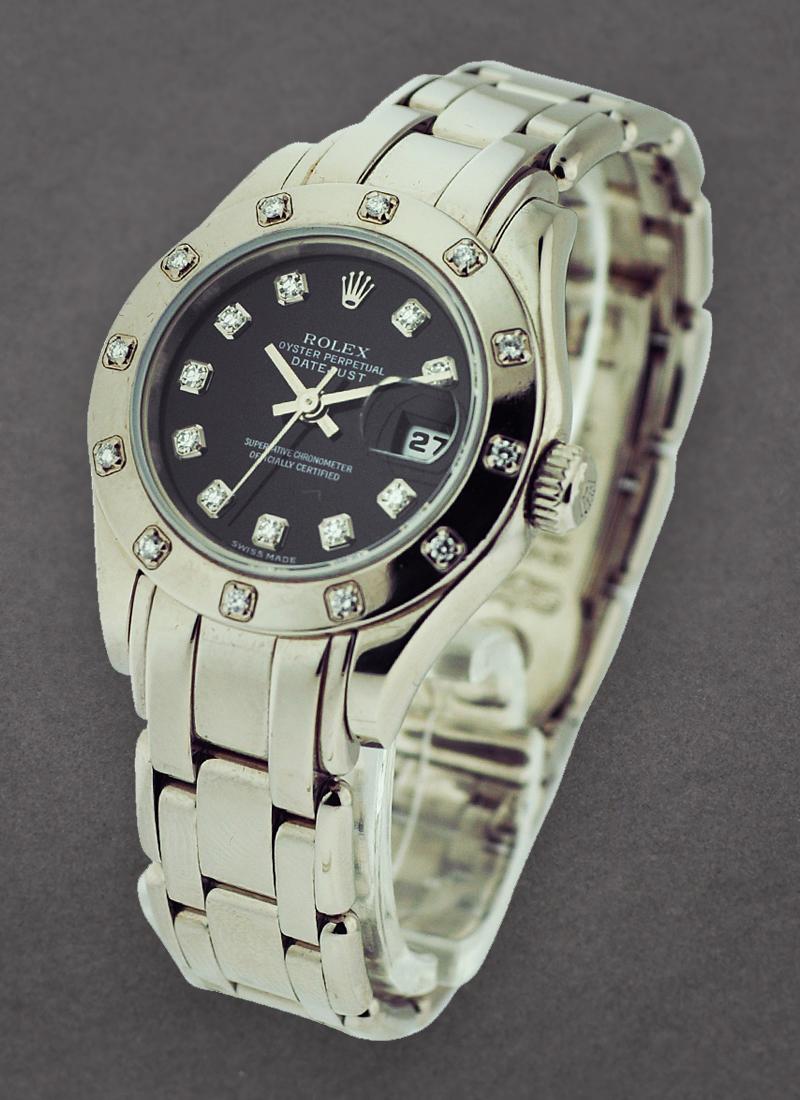 Pre-Owned Rolex Masterpiece in White Gold with 12 Diamond Bezel