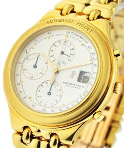 Huitieme Chronograph in Yellow Gold on Yellow Gold Bracelet with Silver Dial