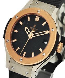 Classic Fusion 33mm in Titanium with King Gold on Black Rubber Strap with Black Dial