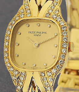 La Flamme Yellow Gold with Diamond Bezel and Bracelet with Champagne Diamond Dial
