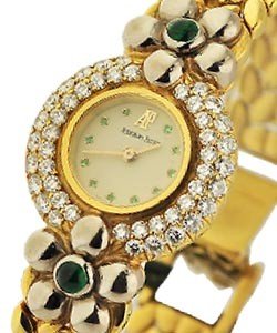 Classic Ladies Round with Diamond Bezel Yellow Gold with White Gold Lugs with Emerald