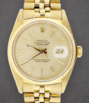 Datejust 36mm in Yellow Gold with Fluted Bezel on Jubilee Bracelet with Champagne Stick Dial