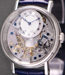 Tradition 7067 GMT White Gold on Strap with Skeleton Silver Dial