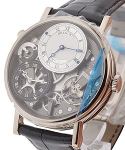 Tradition 7067 GMT White Gold on Strap with Skeleton Silver Dial