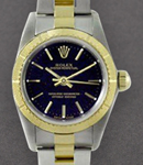 Date in Steel with Yellow Gold Thunderbird Bezel  on Steel and Yellow Gold Oyster Bracelet with Black Stick Dial