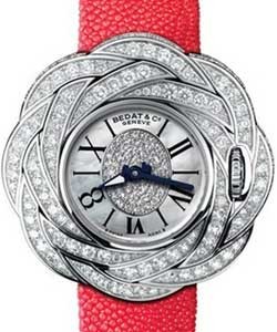 Extravaganza in White Gold with Diamond Bezel on Red Strap with MOP Diamond Dial