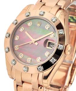 Masterpiece Midsize in Rose Gold with 12 Diamond Bezel on Rose Gold Pearlmaster Bracelet with Black Mother of Pearl Diamond Dial