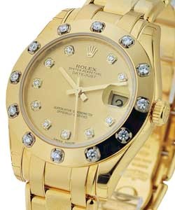 Mid Size Yellow Gold Masterpiece in Yellow Gold with Diamond Bezel on Bracelet with Champagne Diamond Dial